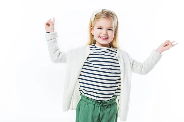 Criança pequena feliz mostrando gestos de paz isolados no branco — Fotografia de Stock