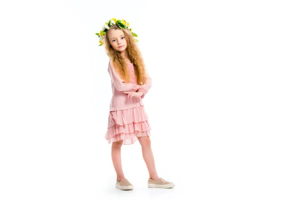 Little child standing and wearing wreath band from flowers isolated on white — Stock Photo