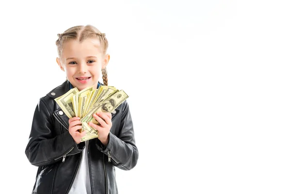 Portrait d'enfant excité dans une veste en cuir tenant des billets isolés sur du blanc — Photo de stock