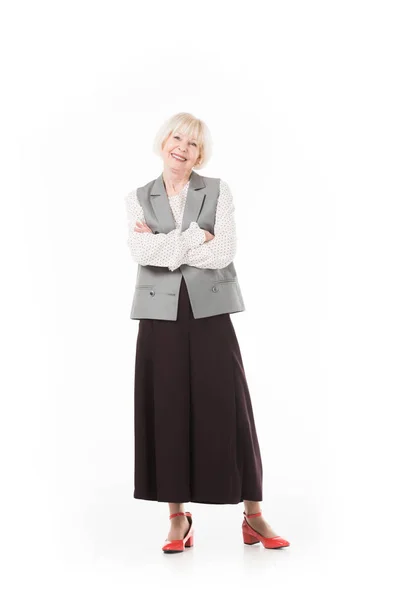 Sorridente donna d'affari anziana in abito formale isolato su bianco — Foto stock