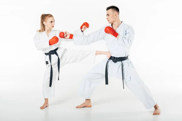 Karate fighters training isolated on white — Stock Photo