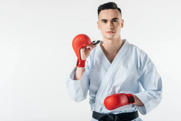 Karatekämpfer mit Mundschutz isoliert auf weiß — Stockfoto