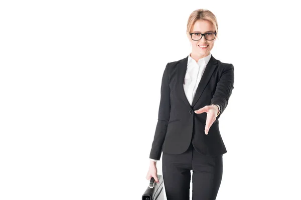 Bionda donna d'affari che tiene la valigetta allungando la mano per una stretta di mano isolata su bianco — Foto stock