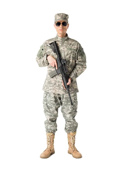 Serious army soldier with gun isolated on white — Stock Photo