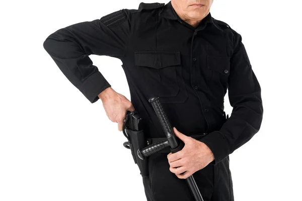 Vista de cerca del policía en uniforme sacando arma aislada en blanco - foto de stock