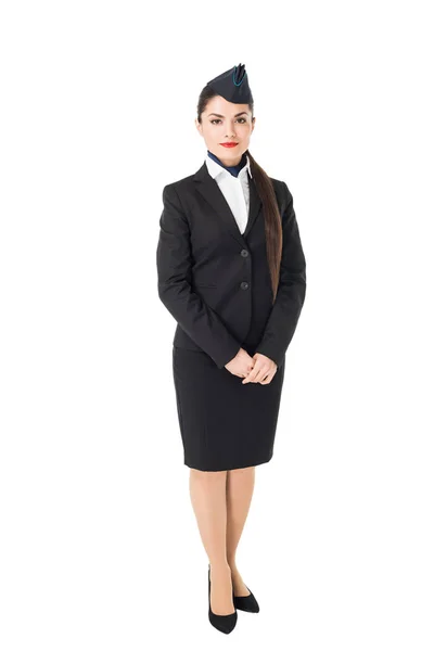 Smiling young stewardess isolated on white — Stock Photo