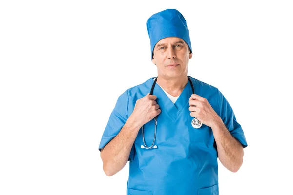Male doctor in uniform holding stethoscope isolated on white — Stock Photo
