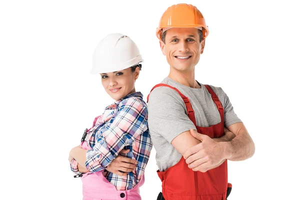 Constructeurs masculins et féminins en hardhats et salopettes isolés sur blanc — Photo de stock