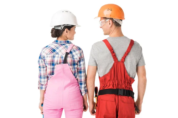 Construction workers team of man and woman in helmets isolated on white — Stock Photo