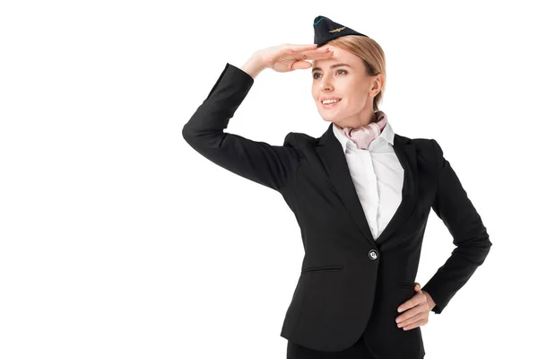 Hostess in uniforme guardando lontano isolato su bianco — Foto stock