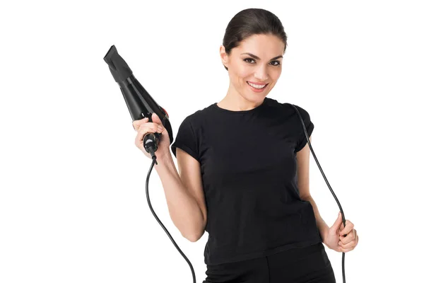 Woman hairdresser with hairdryer isolated on white — Stock Photo
