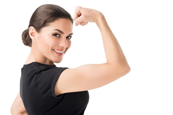 Young woman showing female power gesture isolated on white — Stock Photo