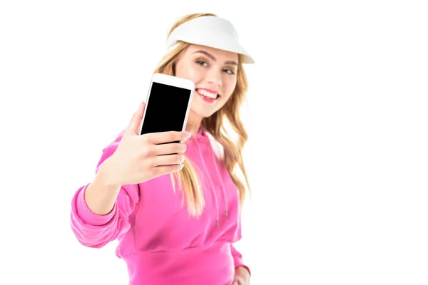 Attractive girl dressed in pink taking selfie isolated on white — Stock Photo