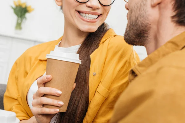 Cropped shot of couple flirting and drinking coffee — Stock Photo