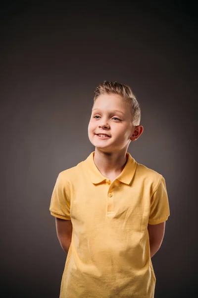 Portrait of adorable preteen boy, isolated on grey — Stock Photo