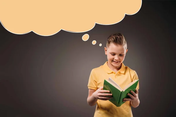 Preteen boy reading book, isolated on grey with speech bubble — Stock Photo