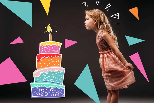 Pretty child in pink dress blowing drawn candle on birthday cake, isolated on grey — Stock Photo