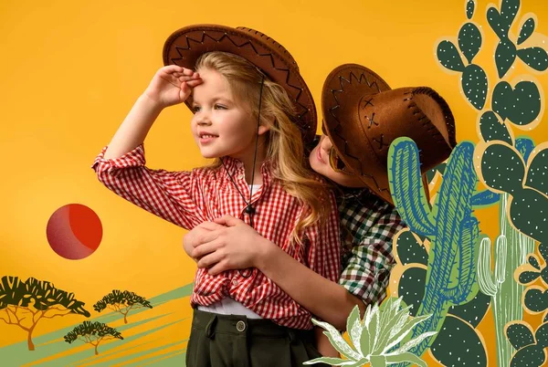 Kleiner Cowboy umarmt stylisches Cowgirl, isoliert auf gelb mit Kakteen Abbildung — Stockfoto
