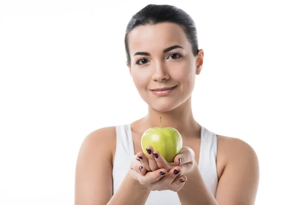 Hermosa chica sosteniendo maduro manzana aislado en blanco - foto de stock