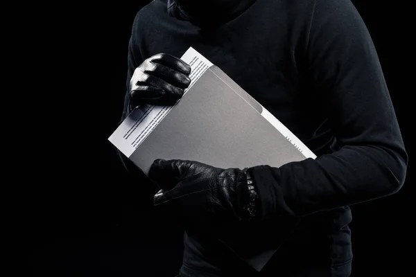 Close-up view of confident documents in hands of thief — Stock Photo