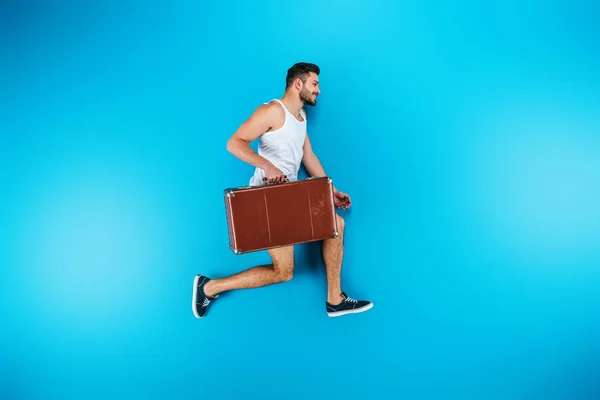 Homme avec valise — Photo de stock