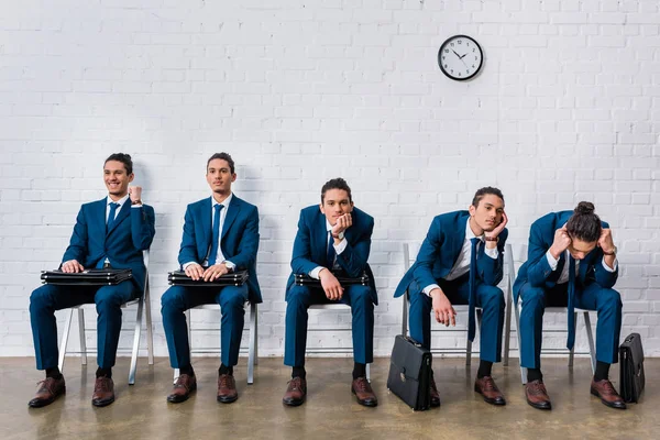 Collage con uomo in giacca e cravatta in attesa di intervista con diverse emozioni — Foto stock