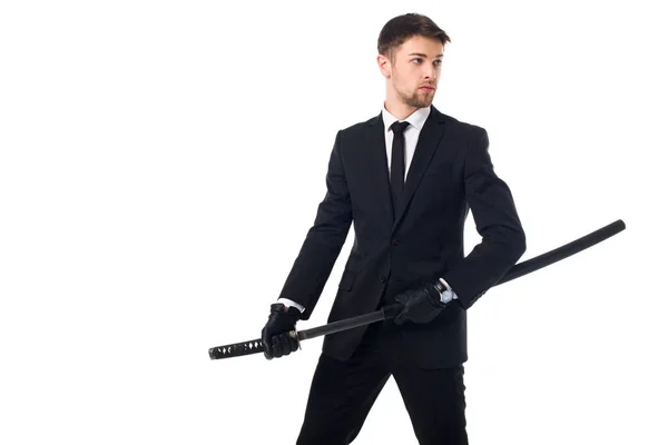 Portrait of agent in suit and gloves with katana isolated on white — Stock Photo