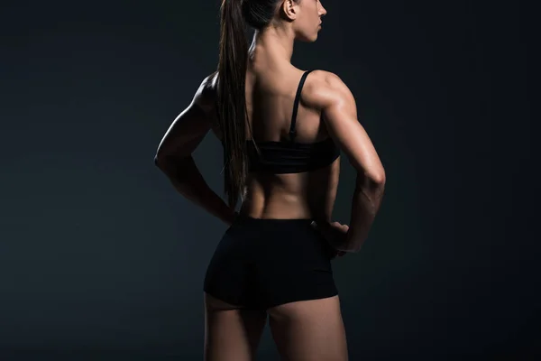 Back view of sportswear with muscular body,  isolated on grey — Stock Photo