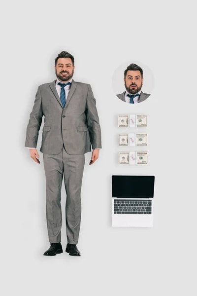 Draufsicht von Geschäftsmann mit Bargeld und Laptop isoliert auf weißem Hintergrund — Stockfoto
