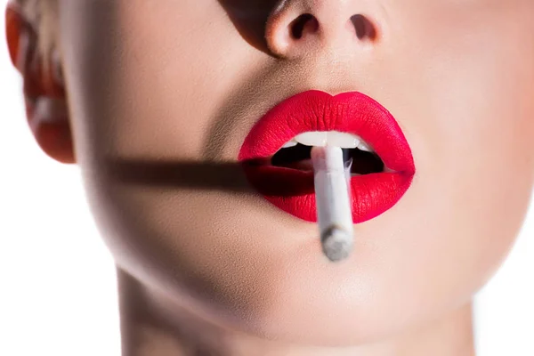 Cropped image of woman holding cigarette with red lips isolated on white — Stock Photo