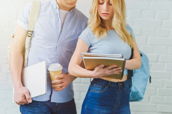 Cropped Shot Young Students Working Together Front White Brick Wall — Stock Photo, Image