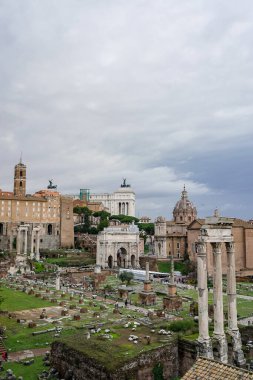 historical landmarks of rome against sky with clouds  clipart