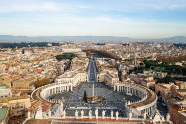 Piazza San Pietro against blue sky in Vatican City  clipart