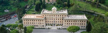horizontal crop of ancient building near gardens of Vatican clipart
