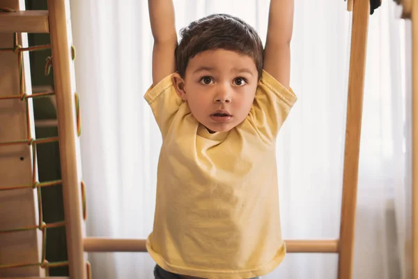 Cute Boy Hanging Horizontal Bar While Exersicing Home Gym — Stock Photo