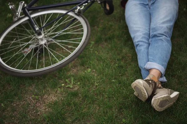 Man in jeans with bicycle — Stock Photo