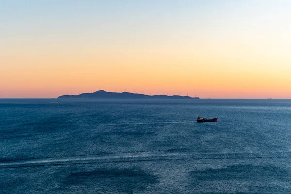 Sunset and tranquil aegean sea in greece — Stock Photo