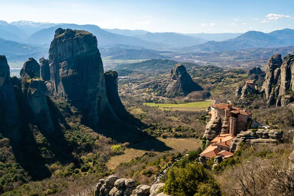 Orthodox monastery on rock formations near mountains in meteora — Stock Photo