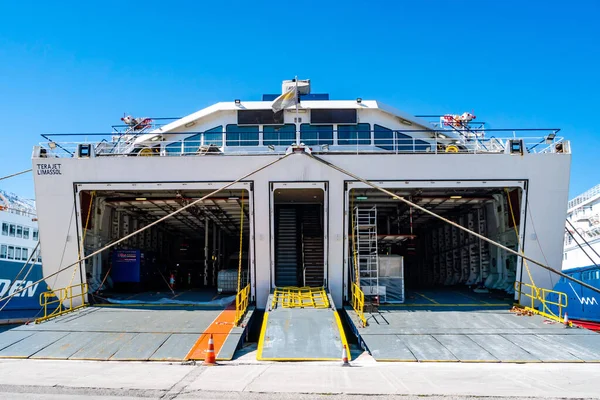 PIRAEUS, GREECE - APRIL 10, 2020: opened rear doors in large ferry with tera jet limassol lettering — Stock Photo