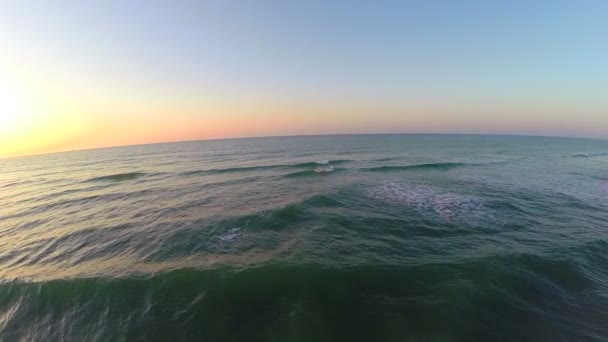 Vibrant sunrise over beach aerial — Stock Video