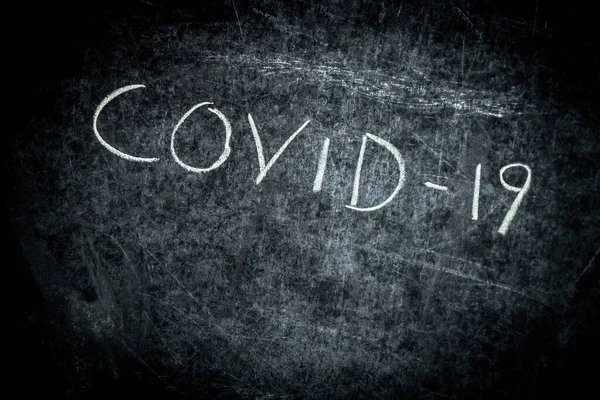 Coronavirus, Covid-19 draw text with chalk on blackboard — 스톡 사진