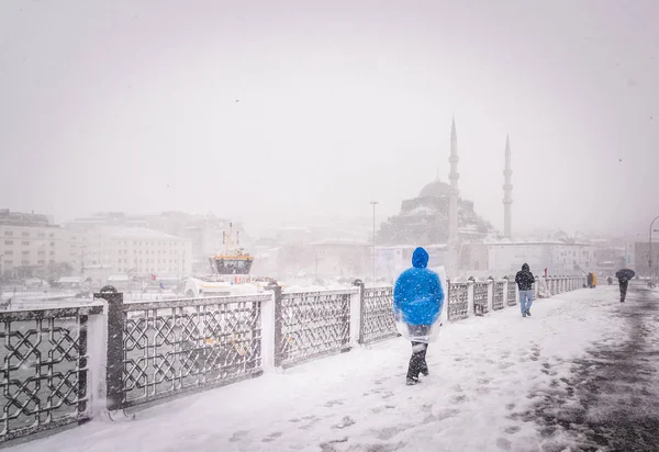 People Walking Galata Bridge Snowy Day Winter New Mosque Background — стоковое фото