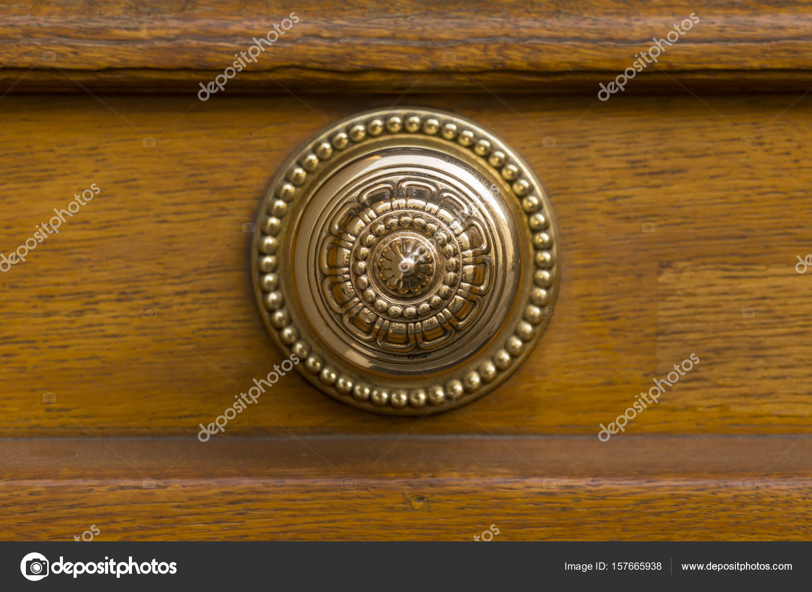 Brown Wooden Door With Round Golden Door Knob Stock Photo