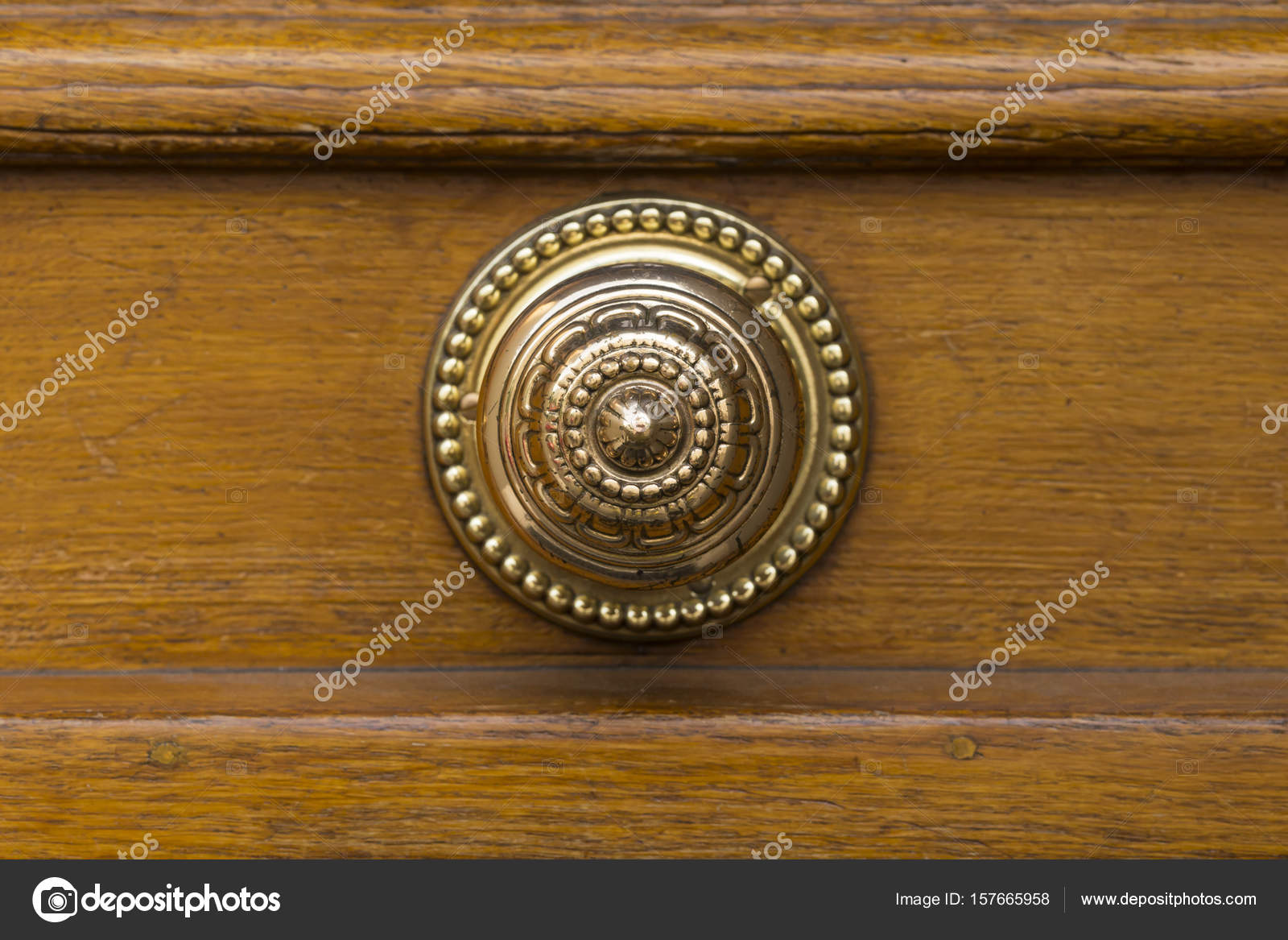 Brown Wooden Door With Round Golden Door Knob Stock Photo