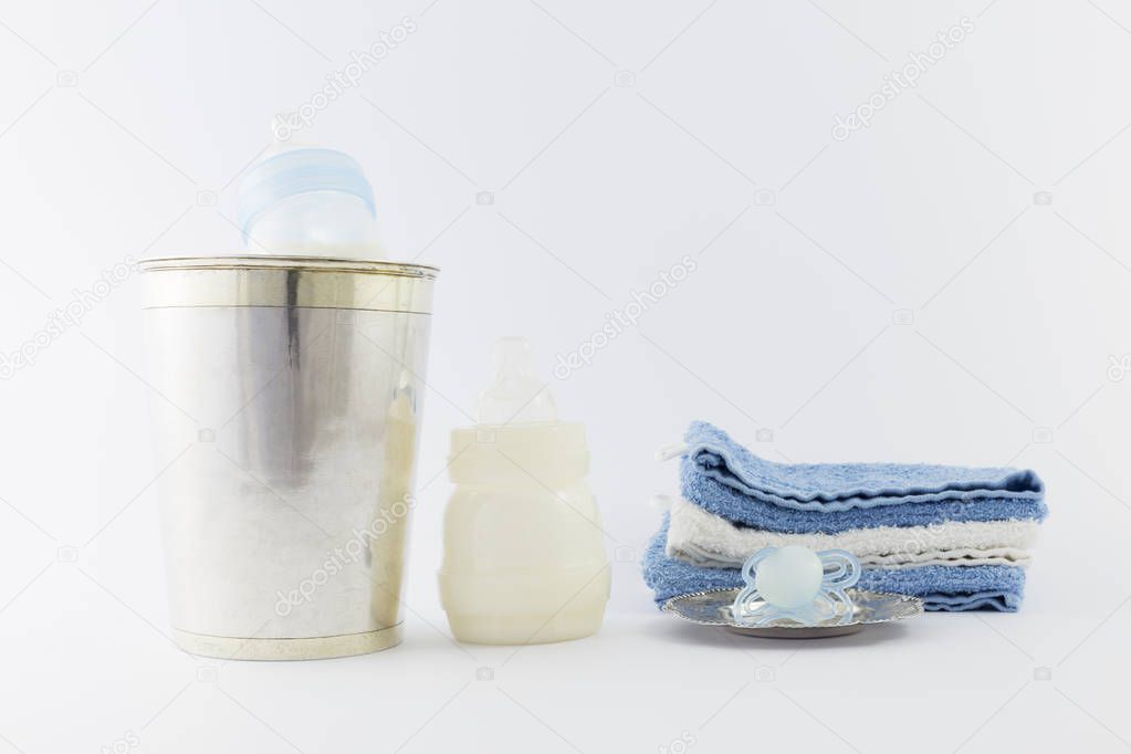 Baby boy luxury items on white background