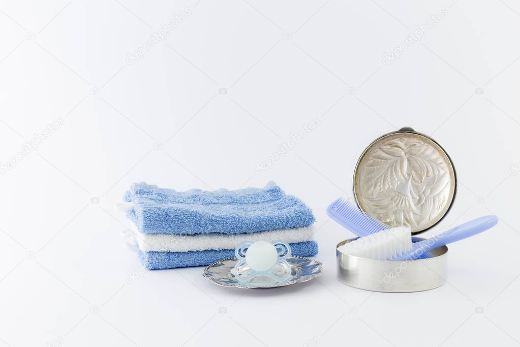 Baby boy luxury items on white background