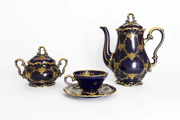 Beautiful cobalt blue colored vintage porcelain tea set with gol — Stock Photo, Image