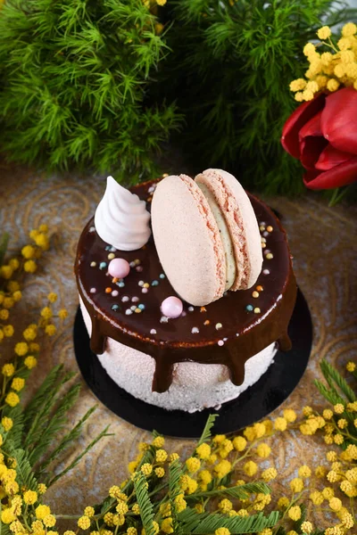 Fresh luxury chocolate dripping cake , macaroon on top dessert. Catering Dining Eating Party Sharing Concept. Mother\'s Day, Valentine Day, Woman\'s Day, Happy Birthday. Appetizing tasty, fun, colorful