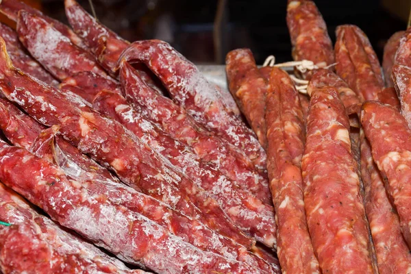 Sausages on Borough market in London. Sausages is large thick French sausages, typically form in texture and flavored with herbs.