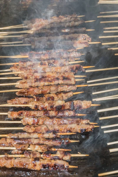 Shish kebab, a popular meal of skewered and grilled cubes of meat. It is similar to or synonymous with a dish called shashlik, which is found in the Caucasus region. Type of kebab